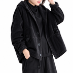 Back view of women's brown and black short jackets