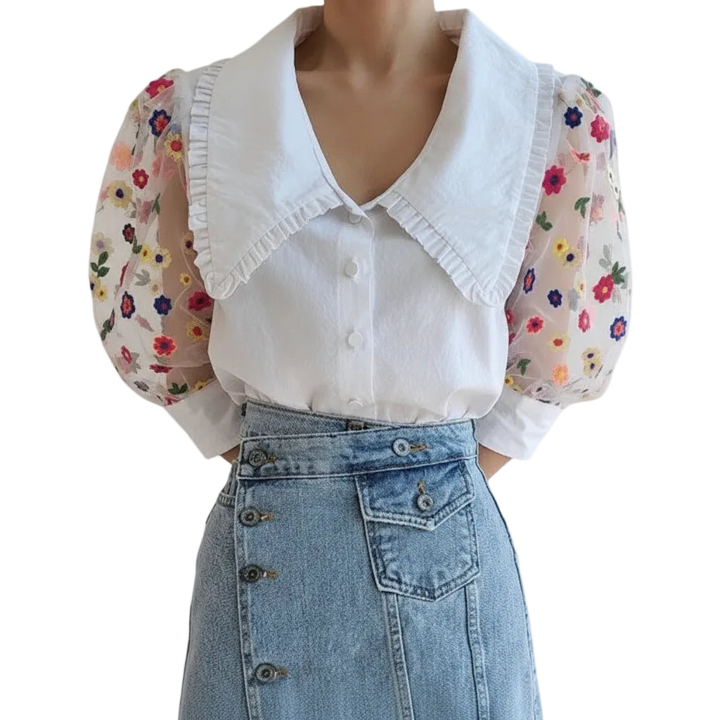Women's daisy embroidered cotton blouse front view